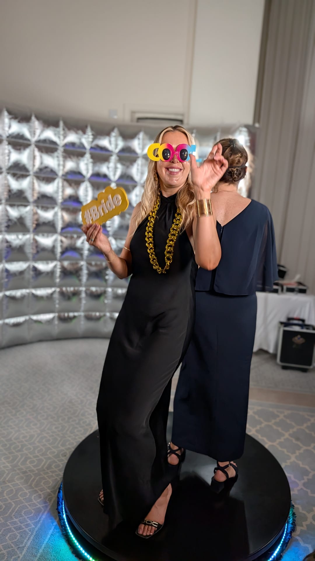 XL 360 photo booth hire Nottingham — wedding guests on the 120cm platform with the silver curved backdrop