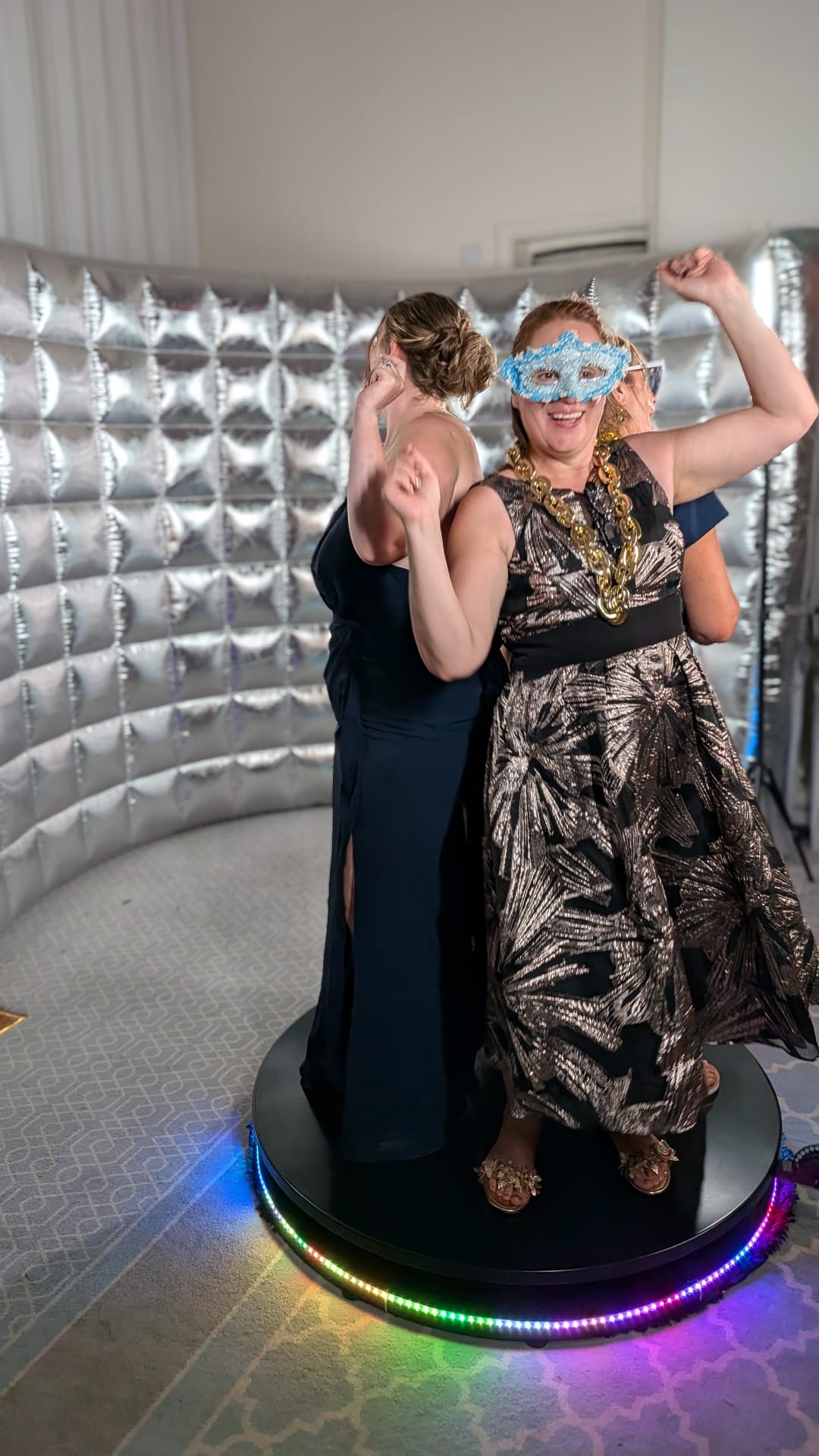 XL 360 video booth wedding hire — guests with props on the illuminated 120cm platform