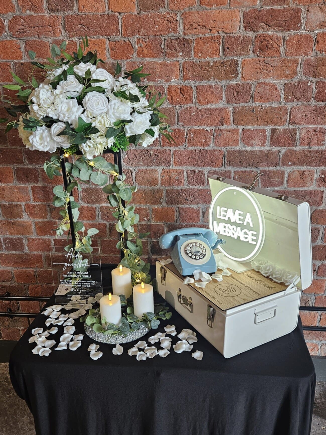 The Luxe Audio Guestbook — fully styled vintage phone station with linen, candles and LED signage