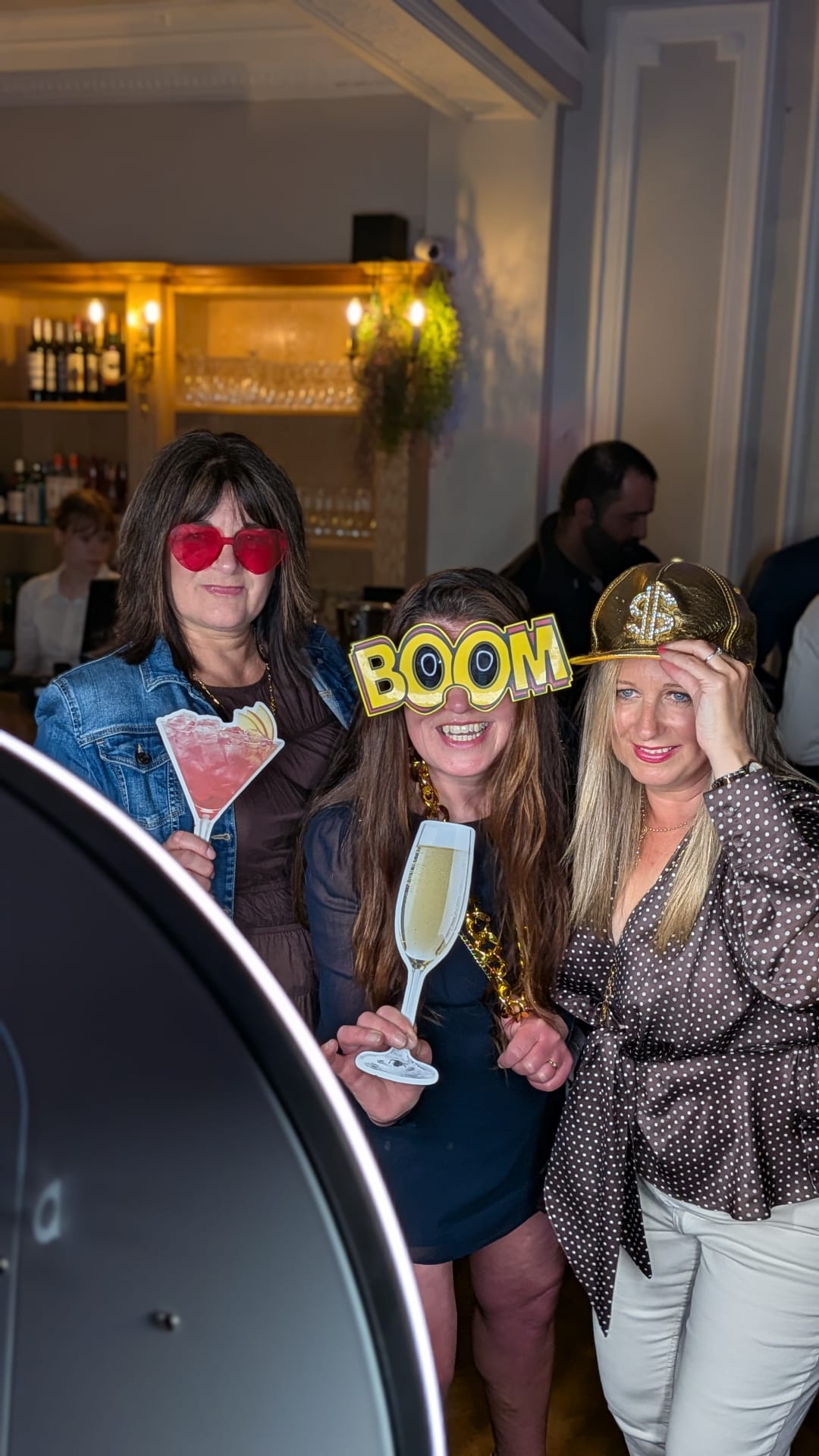Guests with props at Birmingham Christmas party